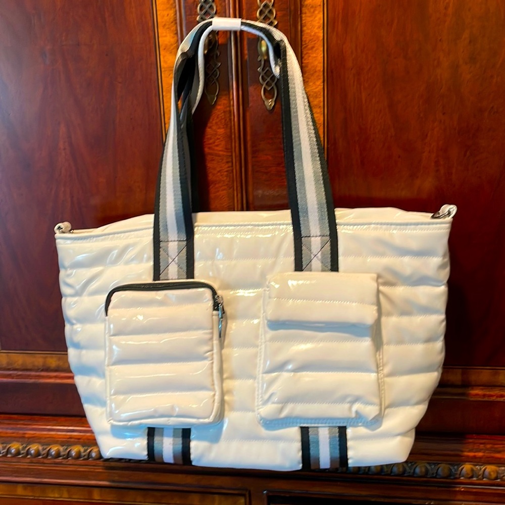 Think Royln white patent small wingman
